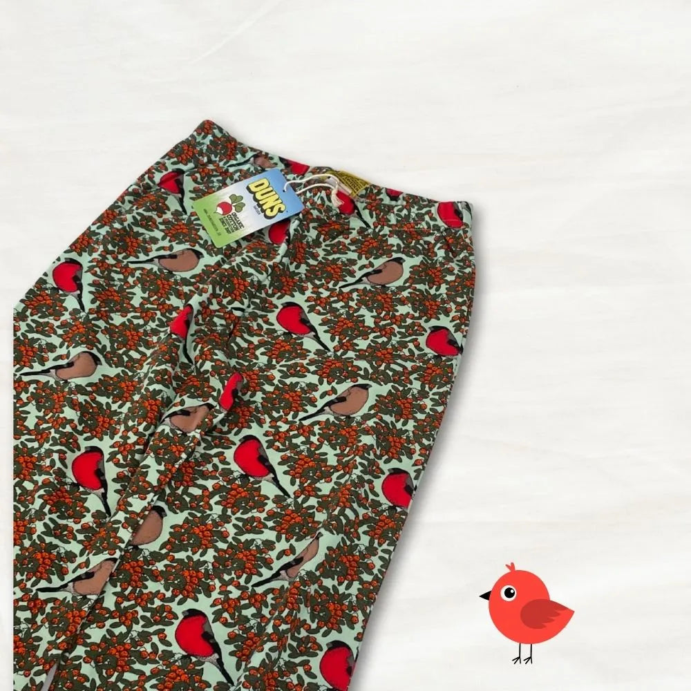 Patterned leggings with bird design on a white background