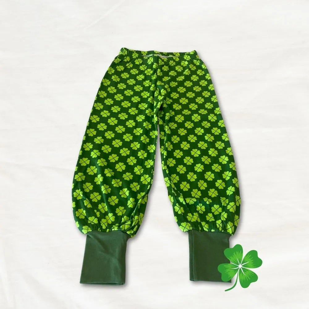 Green pants with clover pattern on a white background