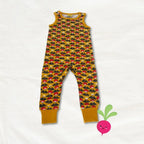 Children's sleeveless romper with mushroom pattern on a white background