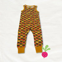Children's sleeveless romper with mushroom pattern on a white background