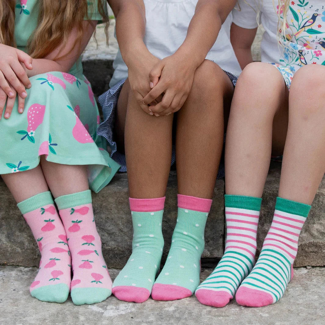 Three girls in socks