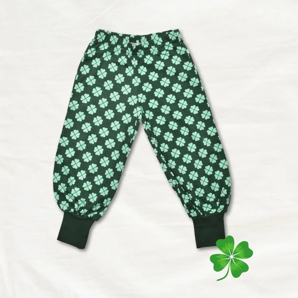 Green pants with clover pattern on a white background