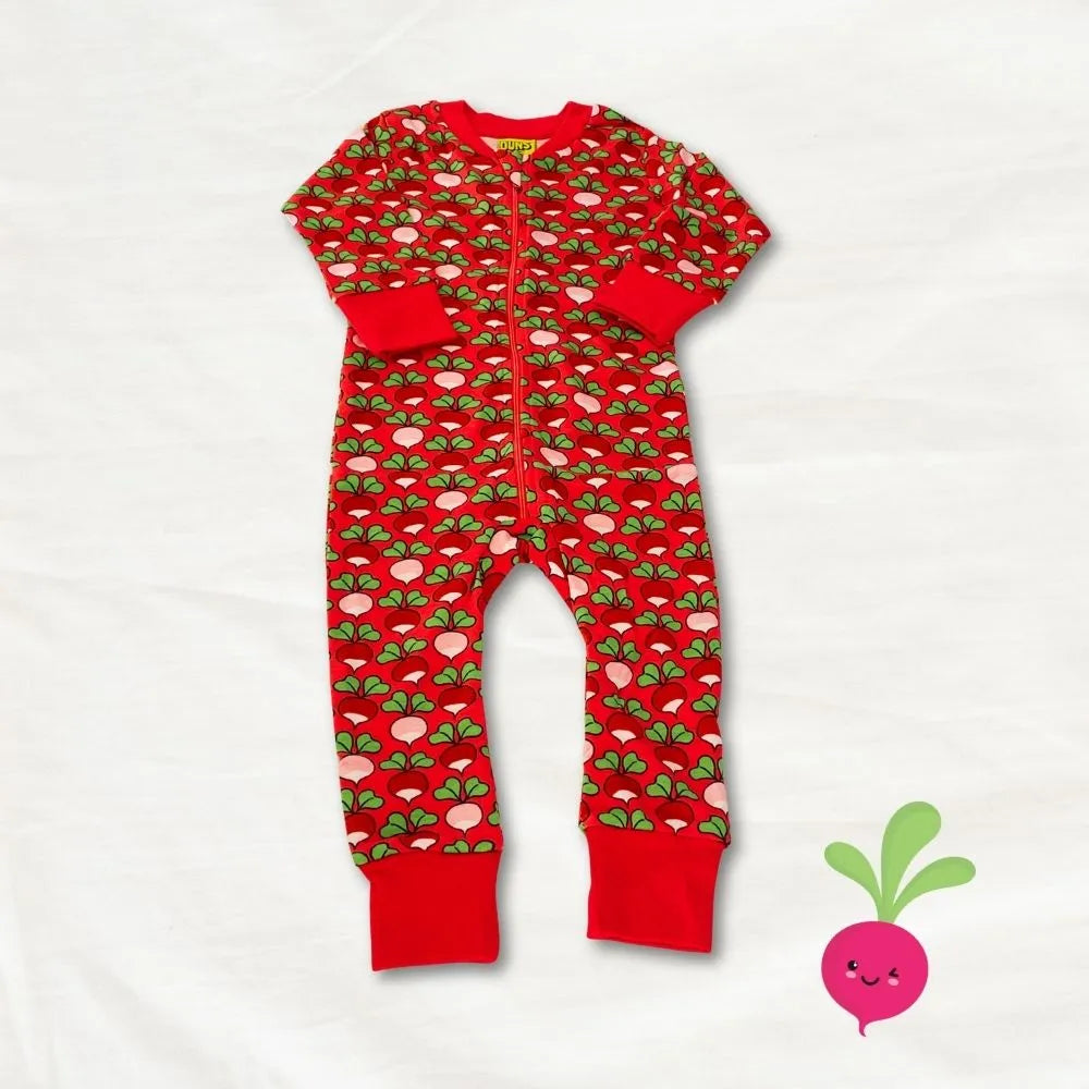 Red children's onesie with a pattern of radish and leaves on a white background