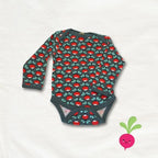 Baby bodysuit with red and green pattern on a white background