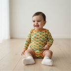 Baby girl wearing organic baby clothes