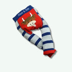Children's leg warmers with cartoon cow design and blue and red stripes on a white background