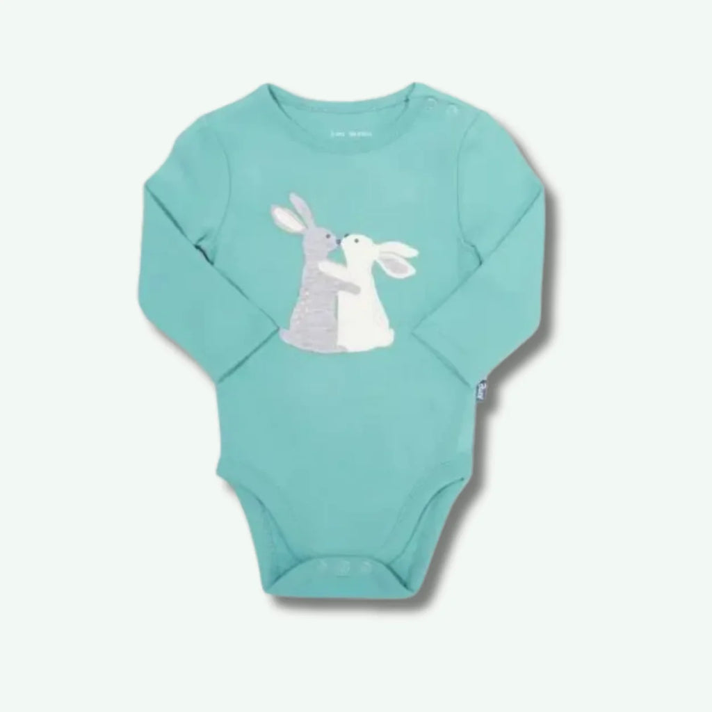 Turquoise baby onesie with bunny design on a white background