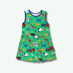 Children's dress with farm animal pattern on a white background