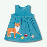 Blue dress with fox and mushroom design on a white background
