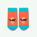 Pair of socks with a cow design on a white background