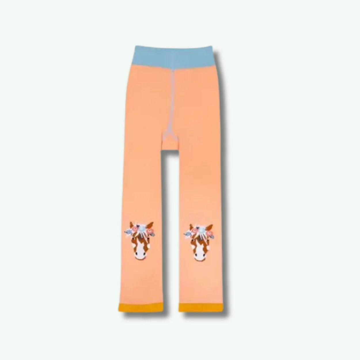 Peach-colored leggings with horse designs on a white background