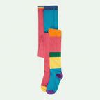 Colorful knee-high socks with horizontal stripes on a light gray background