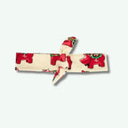 Headband with red elephant pattern on a white background