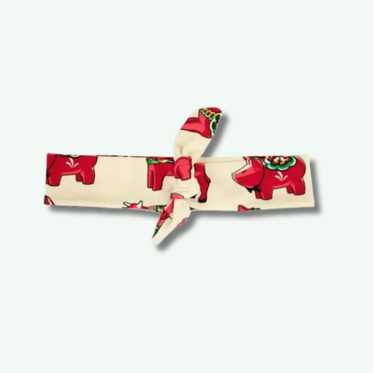 Headband with red elephant pattern on a white background