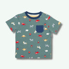 Children's t-shirt with vehicle pattern on a light gray background