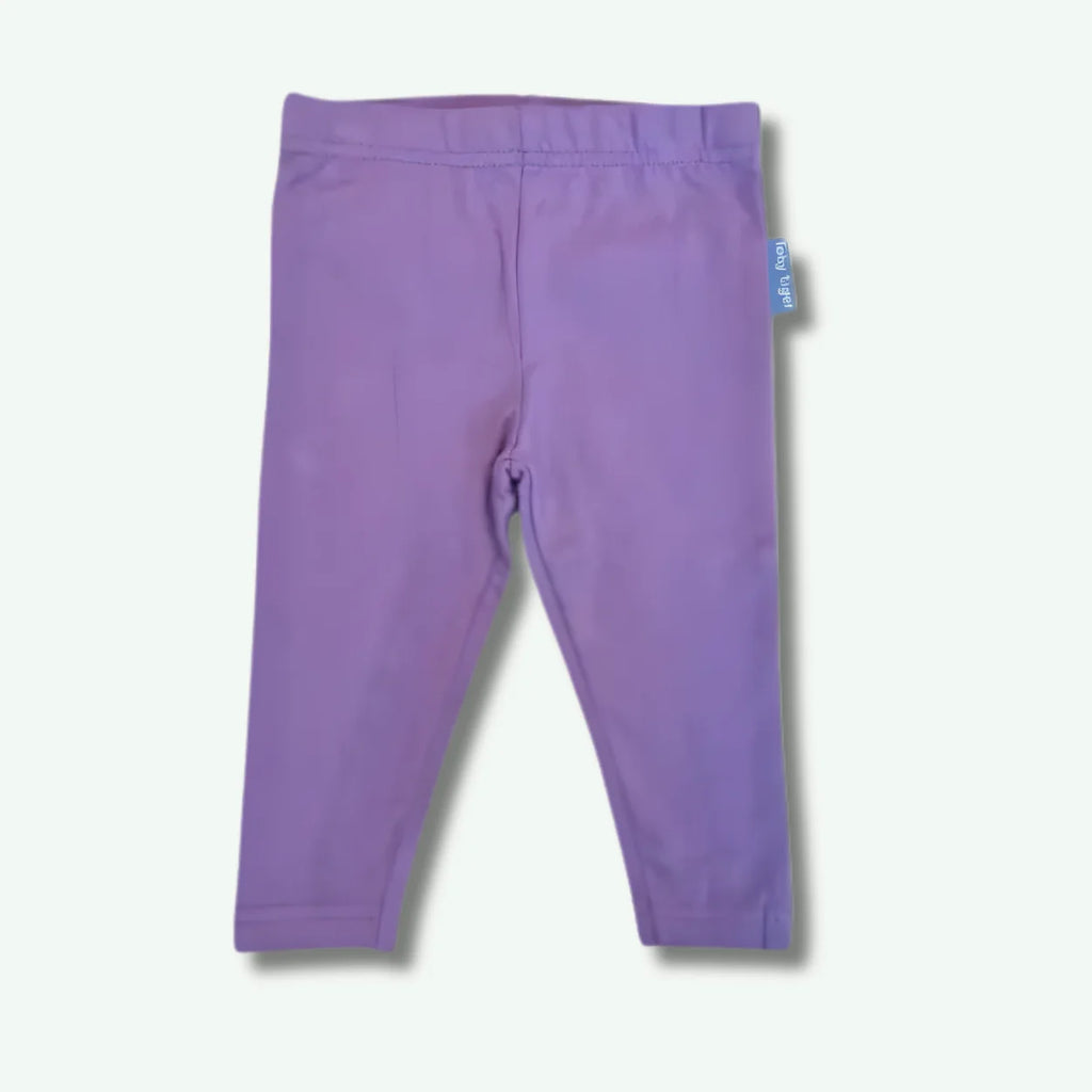Purple leggings with a brand tag on a white background