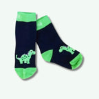 Navy socks with green dinosaur design on a white background