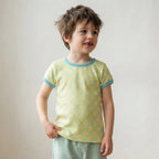 Boy wearing bright organic tshirt 100 cotton