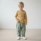 Boy wearing radish top