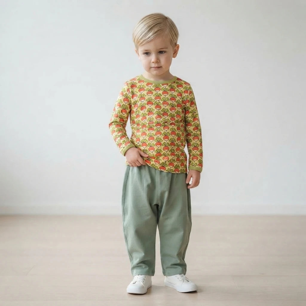 Boy wearing radish top