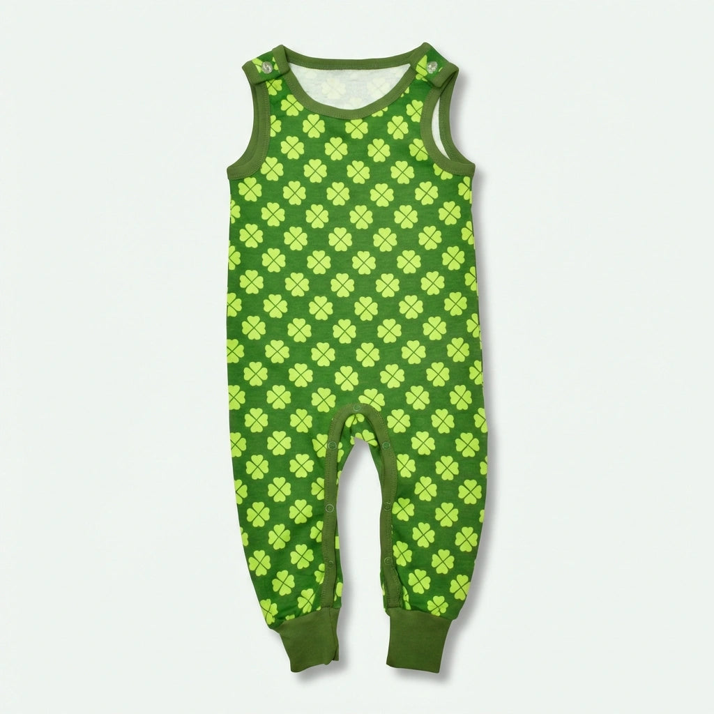 Green baby romper with four-leaf clover pattern on a white background