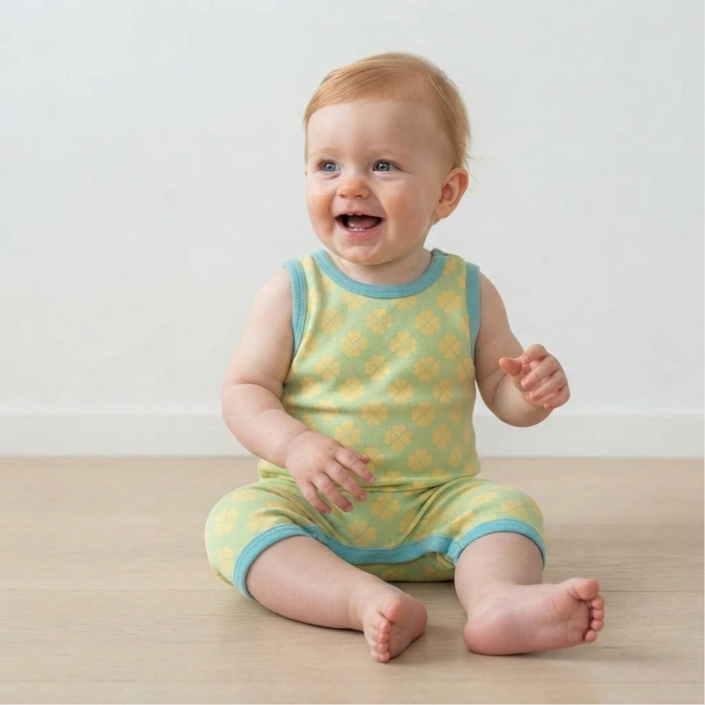 Baby boy wearing green and blue baby clothes infant romper