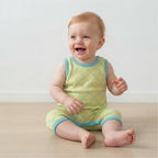 Baby boy wearing green and blue baby clothes infant romper