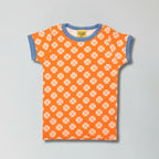 Vibrant orange clover print organic cotton t-shirt for babies and kids — Baby Goes Retro