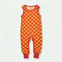 Red and yellow patterned baby romper on a white background