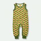 Green children's romper with red mushroom pattern on a white background