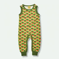Green children's romper with red mushroom pattern on a white background