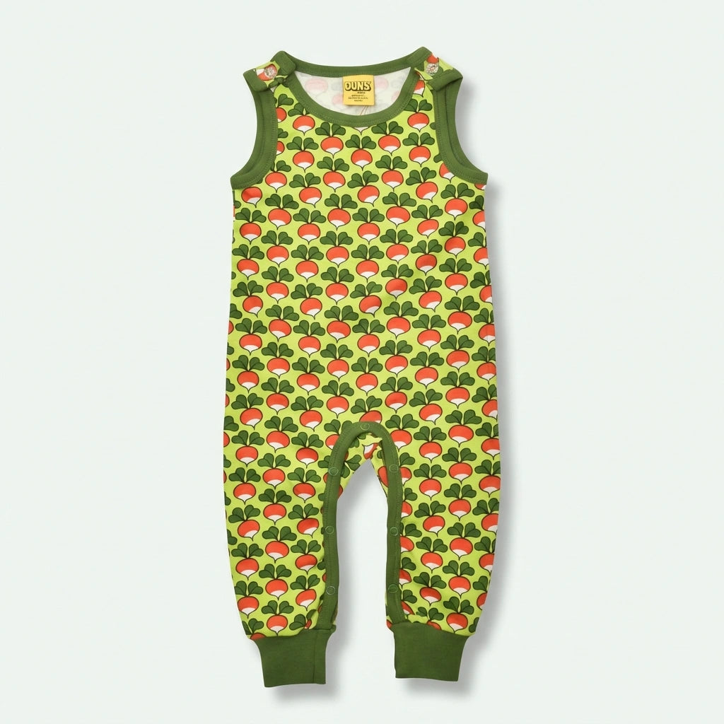 Green children's romper with red mushroom pattern on a white background