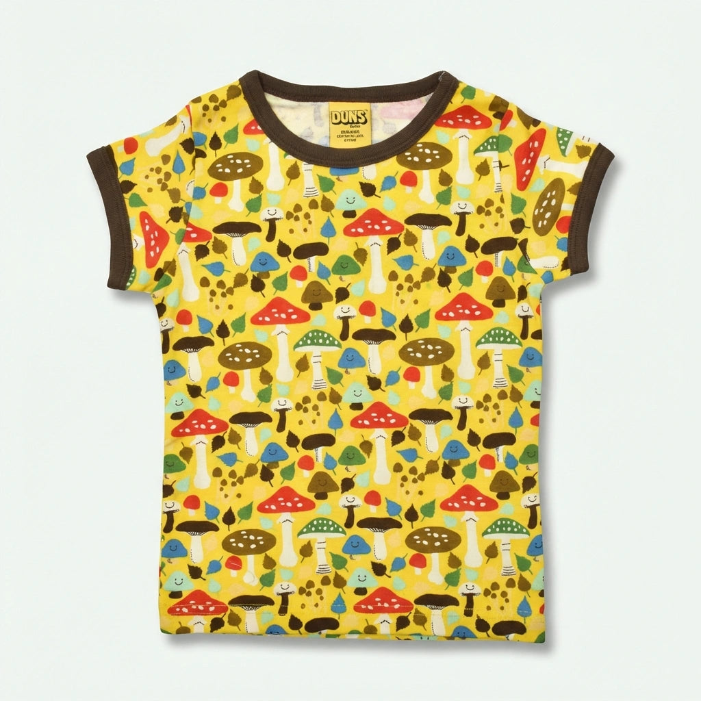 Children's t-shirt with colorful mushroom pattern on a yellow background