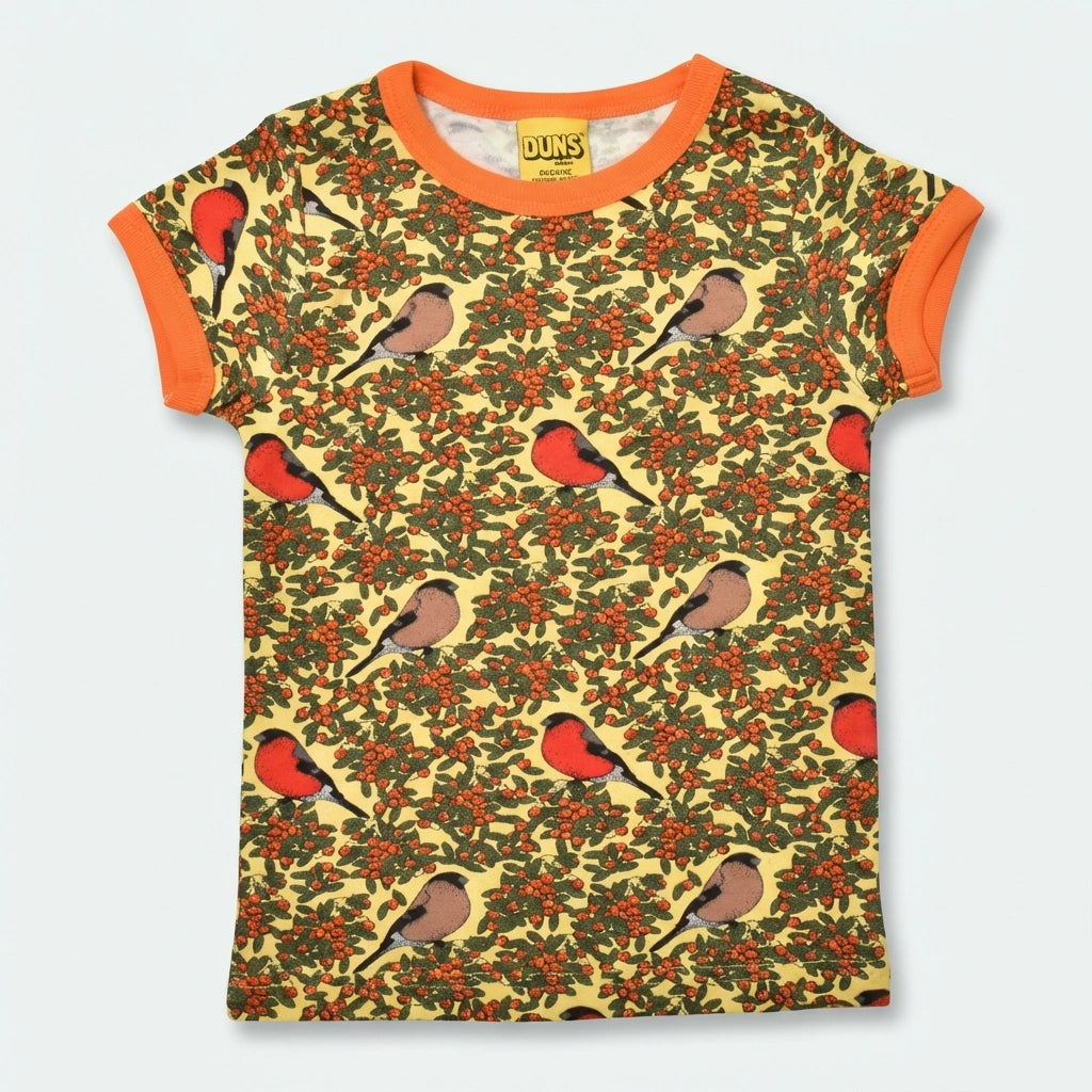 T-shirt with bird and berry pattern on a plain background