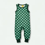Green romper with clover pattern on a white background