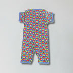 Baby romper with colorful pattern on a gray background