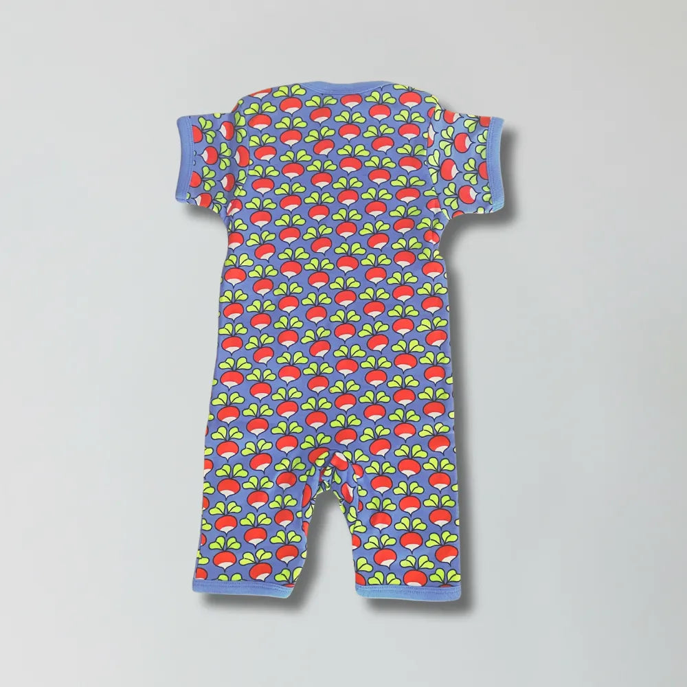 Baby romper with colorful pattern on a gray background