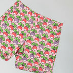 organic cotton shorts with radish pattern on a pink background