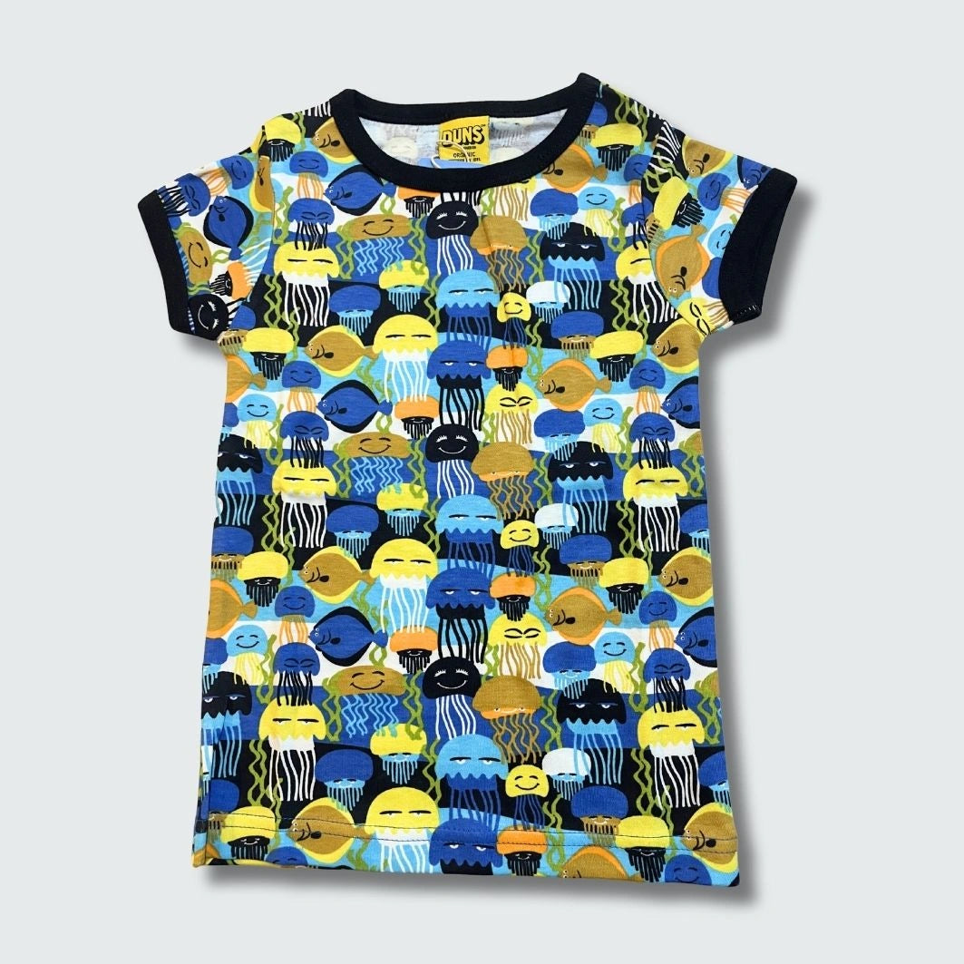 Organic jellyfish print short sleeve top styled with matching toddler dress, in black with black trim, DUNS Sweden – organic kidswear, toddler dress
