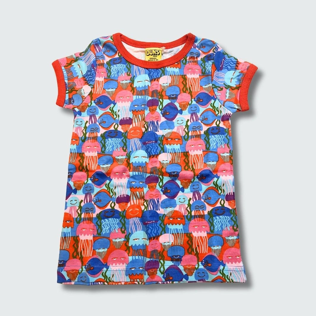 Organic jellyfish print short sleeve top styled with matching toddler dress, in blue with orange trim, DUNS Sweden – organic infant clothes, toddler dress