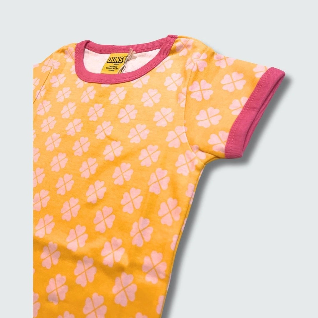 Organic clover print kidswear infant shirt in radiant yellow with hot pink trim, DUNS Sweden – kidswear, infant shirts