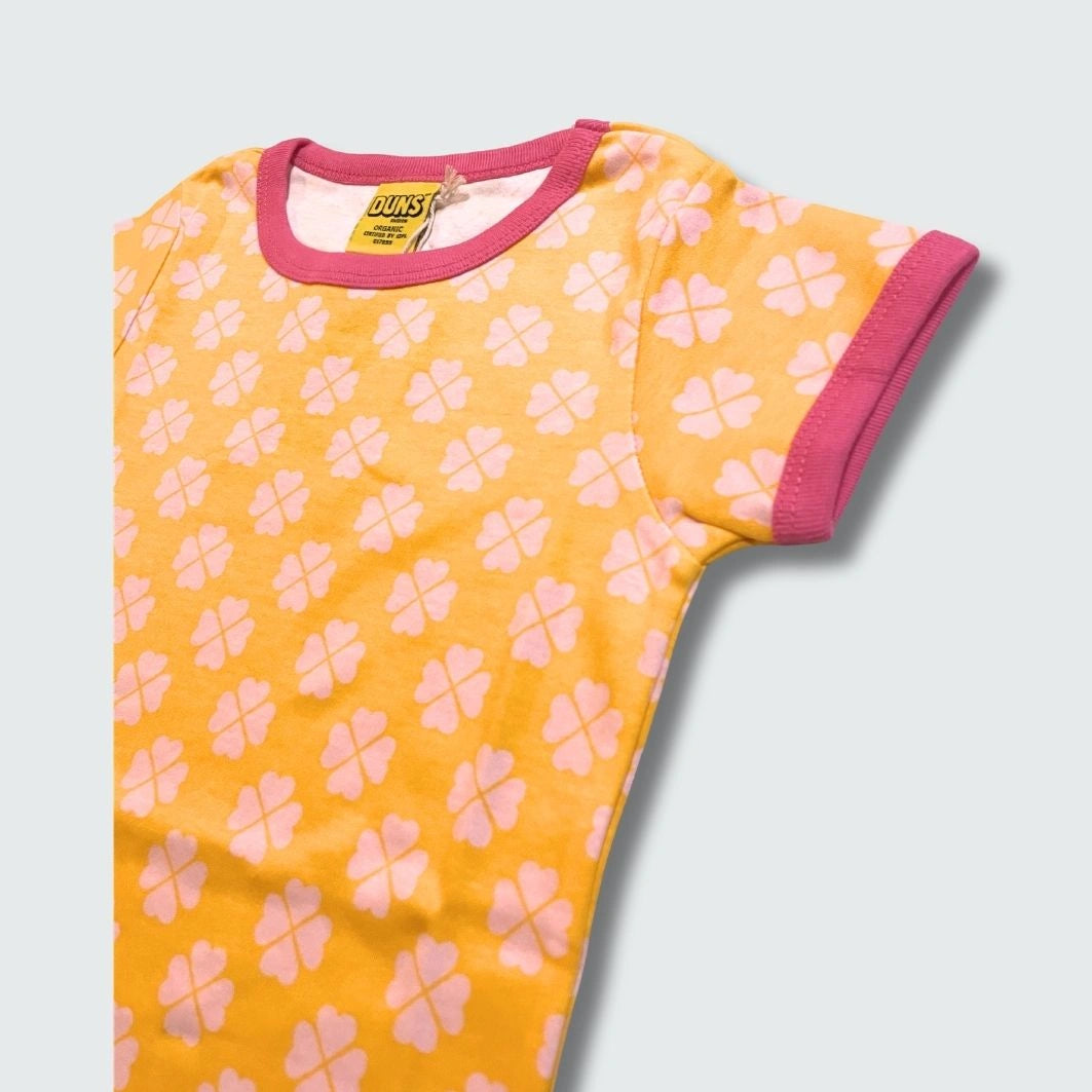 Organic clover print kidswear infant shirt in radiant yellow with hot pink trim, DUNS Sweden – kidswear, infant shirts