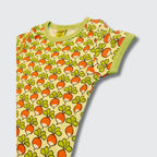 Children's sleeveless shirt with carrot pattern on a light gray background