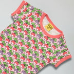 Children's t-shirt with colorful pattern on a gray background