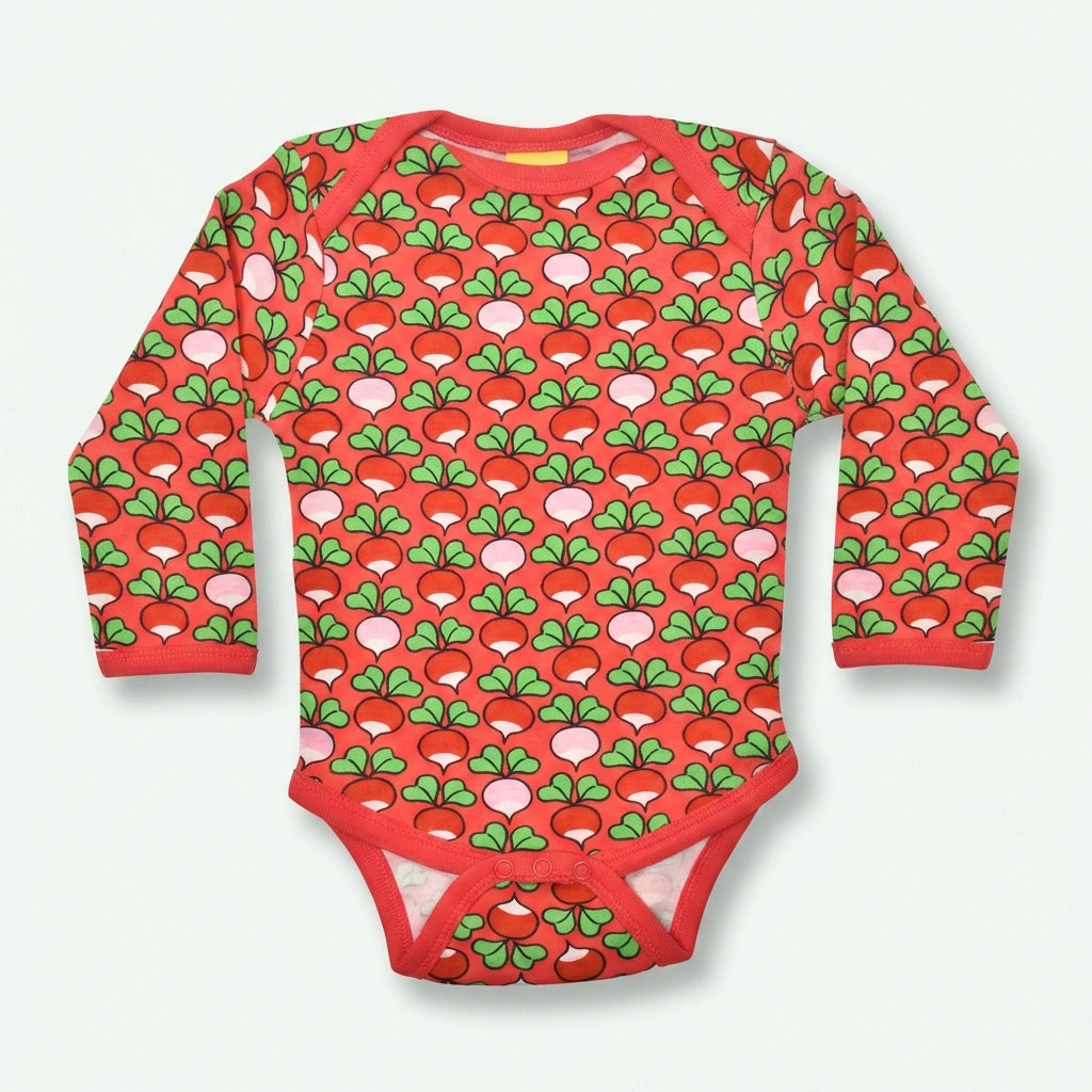 Red baby onesie with green and pink pattern on a white background