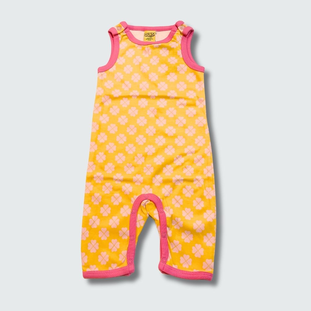 Clover print play suit romper in radiant yellow with hot pink trim, DUNS Sweden – rompers suit, infant clothes unisex