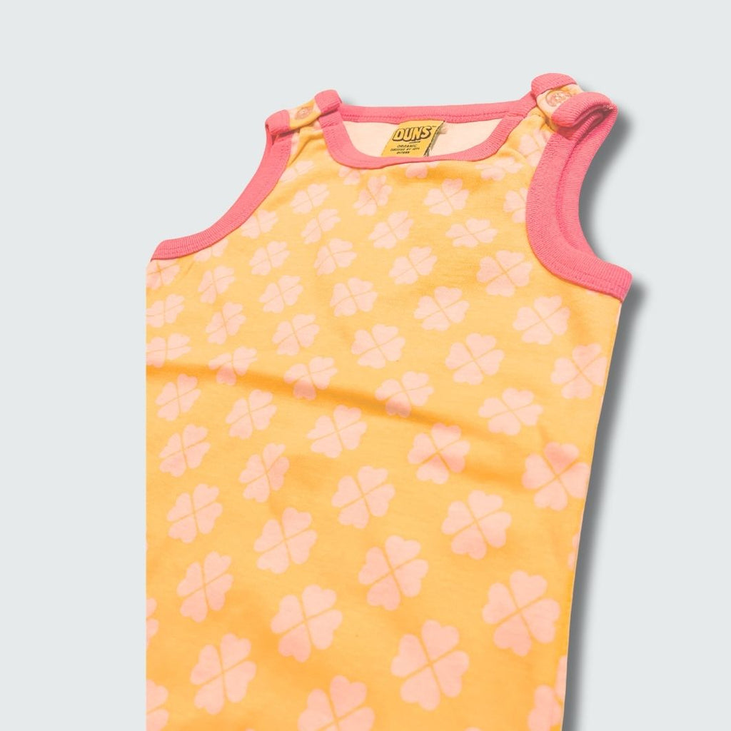 Clover print play suit romper in radiant yellow with hot pink trim, DUNS Sweden – rompers suit, infant clothes unisex