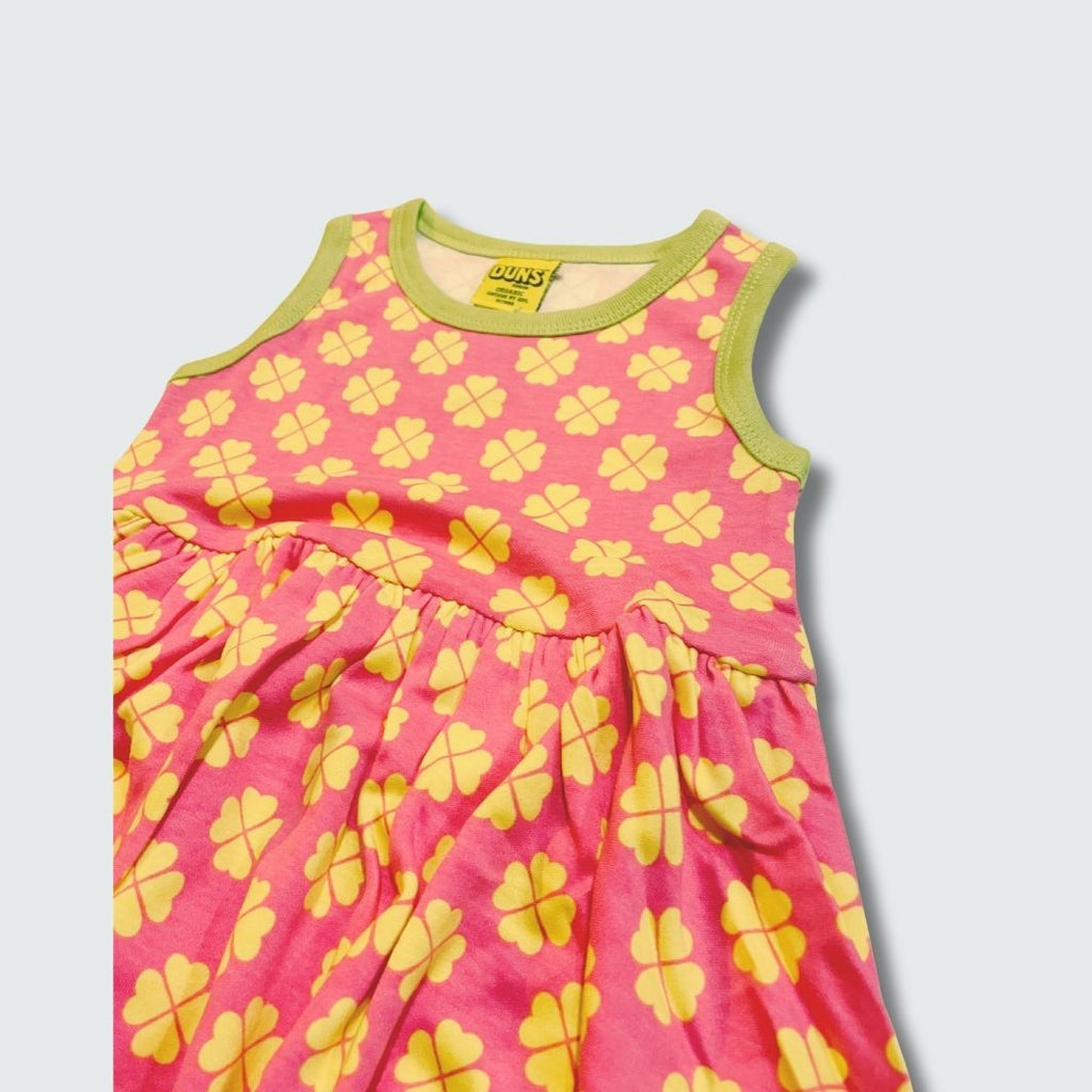 Clover print sleeveless gather dress in hot pink with bright chartreuse green trim, DUNS Sweden – toddler dress, infant clothes unisex