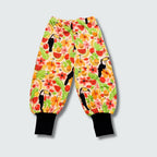 Tucan print baggy pants in vanilla custard with black trim, DUNS Sweden – toddler leggings, infant clothes unisex
