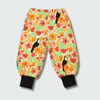 Tucan print baggy pants in vanilla custard with black trim, DUNS Sweden – toddler leggings, infant clothes unisex